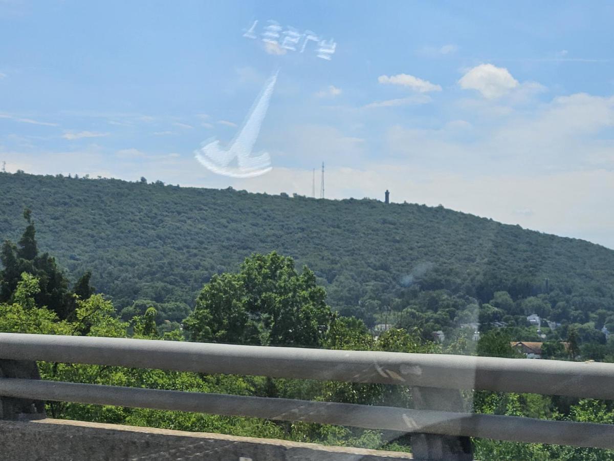 Lush Pennsylvania hillside with communication towers